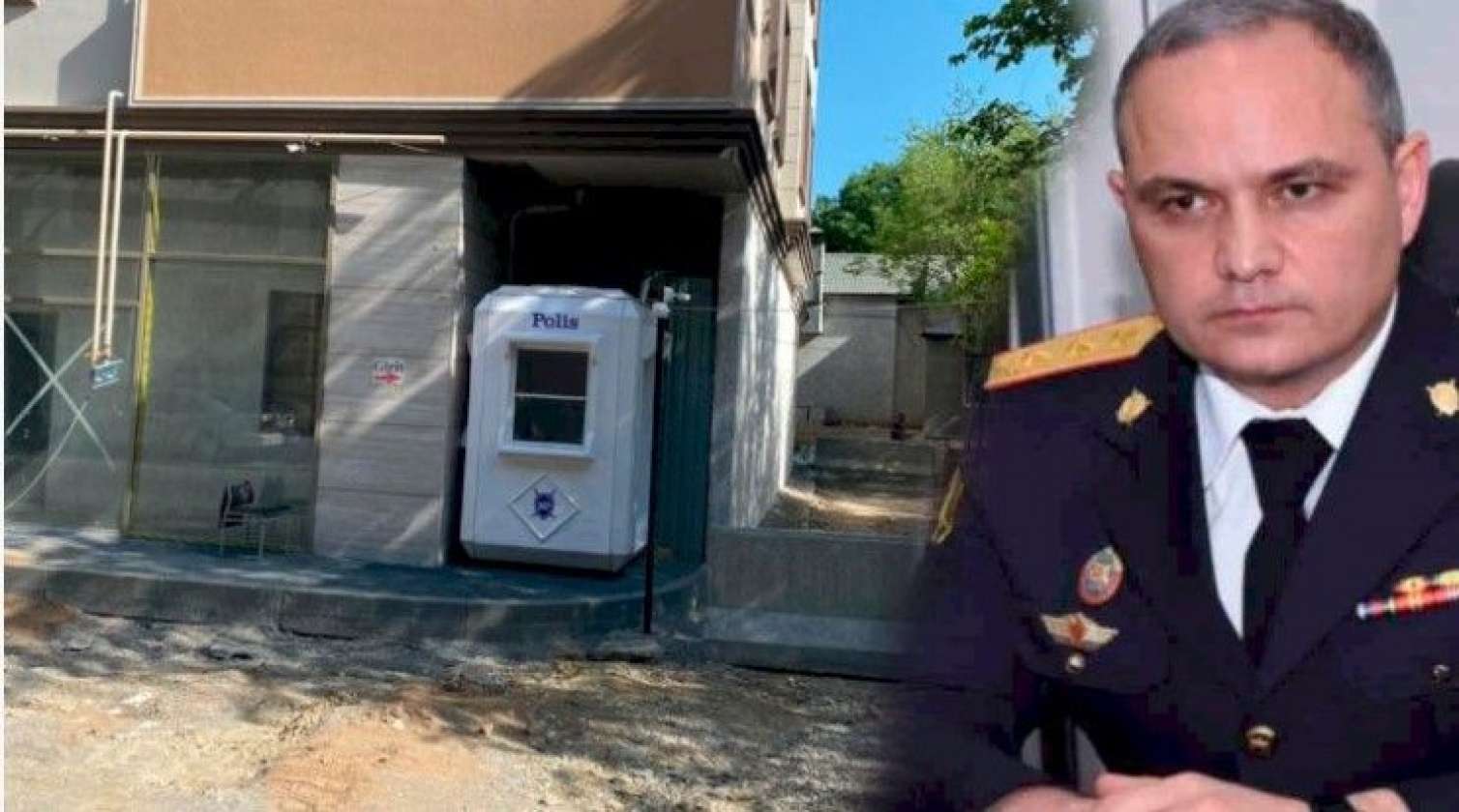 Polis rəisi Bakıda binanın giriş-çıxışını hasarladı -  VİDEO