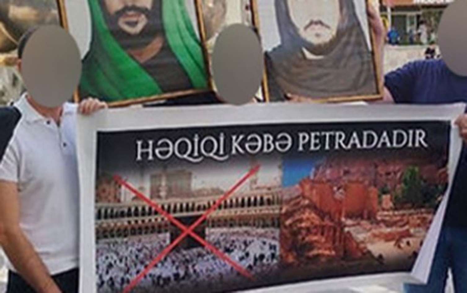 “28 Mall”un qarşısında plakat açan təriqət üzvləri həbs edildi 