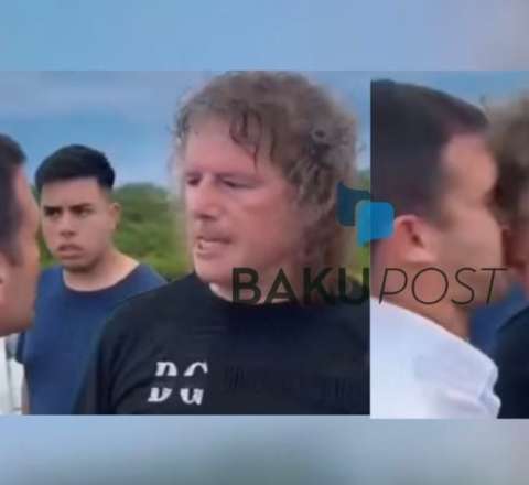 Yardım paylayan deputatı döydü - VİDEO