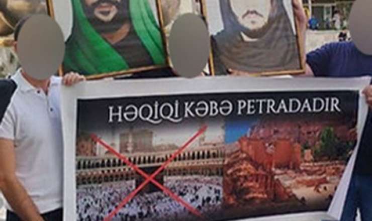 “28 Mall”un qarşısında plakat açan təriqət üzvləri həbs edildi 