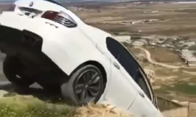 Bakıda BMW-ni dərəyə yuvarlayan şəxs həbs olundu - VİDEO